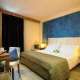 HOTEL GALILEI DI PISA: CAMERA STANDARD Camere moderne e dotate di tutti i comforts all'Hotel Galilei di Pisa.