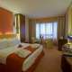 SHERATON PADOVA CAMERA EXECUTIVE atmosfera tranquilla e raffinata, angolo salotto nelle camere Executive dello Sheraton Padova